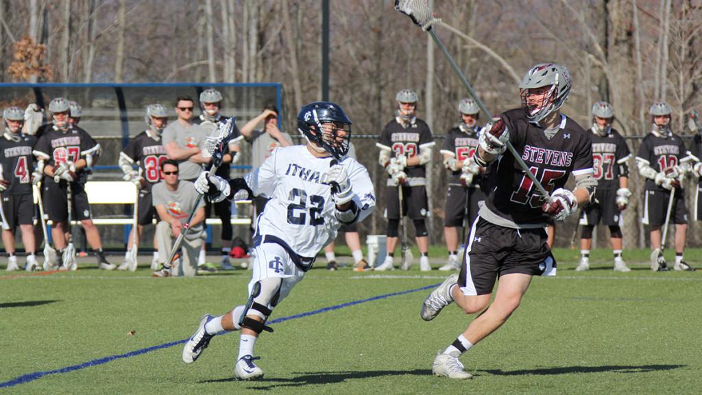 Sophomore attacker John Januszkiewicz drives to the net during the mens lacrosse teams 11–9 win over Stevens Institute of Technology at Higgins Stadium. Januszkiewicz scored four goals in the game.