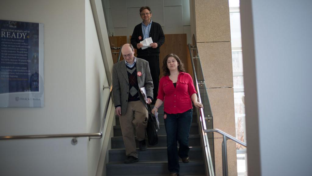 From left, lecturers Robert Ziomkowski, Tom Schneller and Rachel Kaufman exit their meeting with President Tom Rochon.