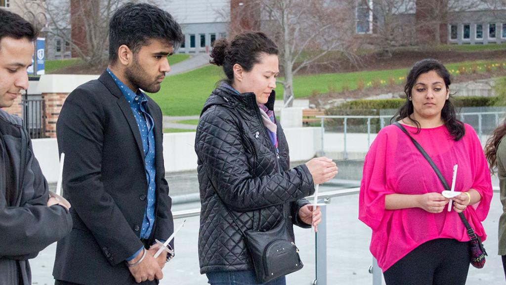 +From+left%2C+grad+student+Girish+Gyawali%2C+sophomore+Taranjit+Singh+Bhatti%2C+Sue-Je+Gage%2Cassociate+professor+of+anthropology+and+sophomore+Serena+Ansari+hold+candles+at+the+vigil+for+Nepal+May+1+outside+of+the+Dillingham+Center.