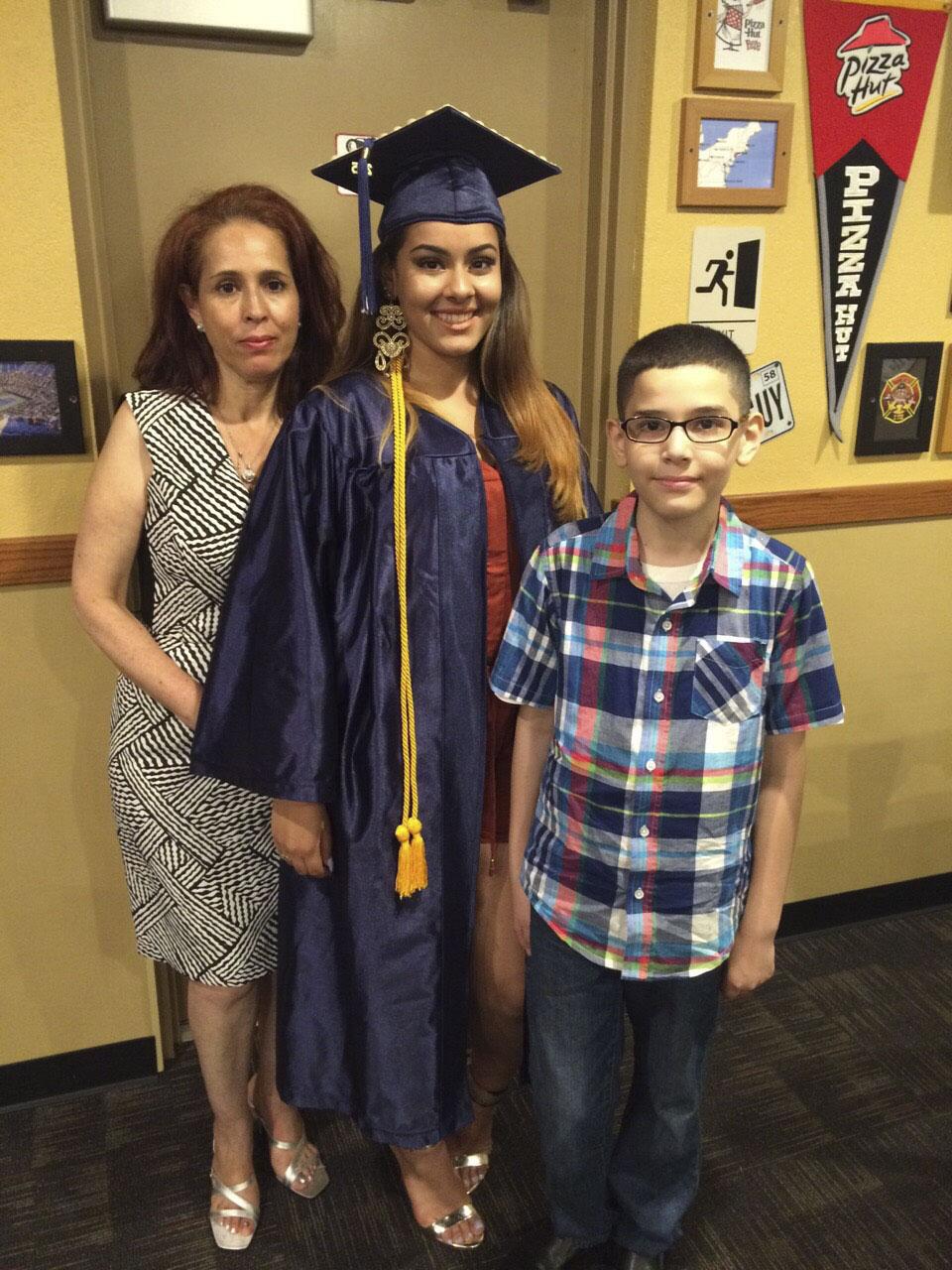 From left, Julissa Martinez’s mother, herself and her little brother.  Courtesy of Julissa Martinez.