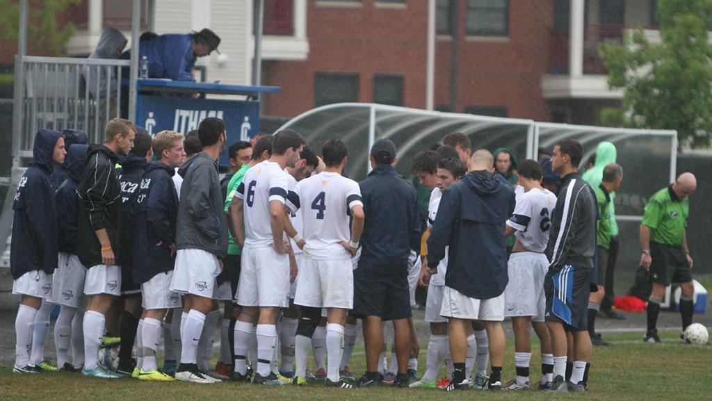 Members of the mens soccer team listen to head coach Patrick Ouckama speak after its game Sept. 12. Mead Loop, in the Department of Journalism, is the newly initiated Faculty Athletic Mentor for the Bombers this season. 