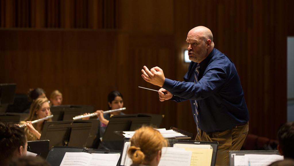 Matthew Inkster conducts Ithaca Colleges Symphonic Band, which will perform Oct. 5.