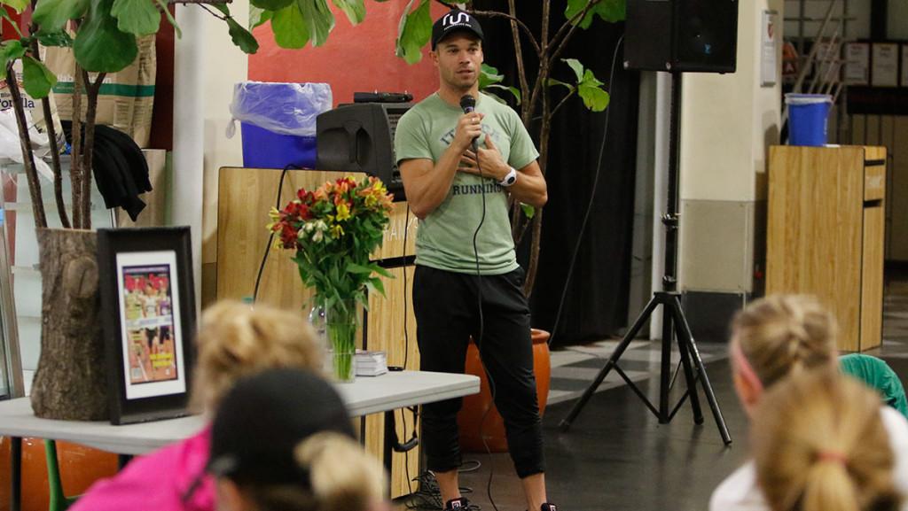 Nick Symmonds talks with fans during a Q&A session on Sept. 29 at the Finger Lakes Running & Triathlon Company. Many Ithaca College student-athletes from the womens cross-country and track and field teams were in attendance. 