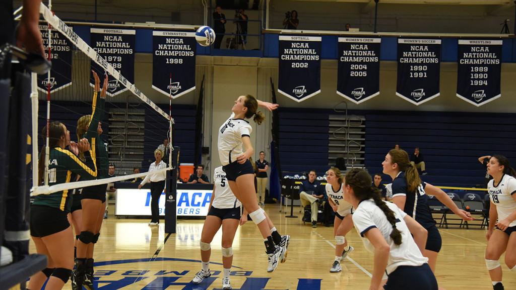 Freshman middle Katie Evans goes in for a kill during the volleyball teams 3–0 win over Keuka College on Sept. 23 at Ben Light Gymnasium. The ninth consecutive win moves the Bombers to 13–1 overall on the season. 
