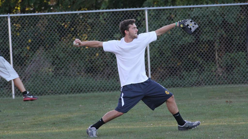 Senior Brian Belvin of the club baseball team takes a swing during the team's practice  Sept. 15 on Emerson Field.