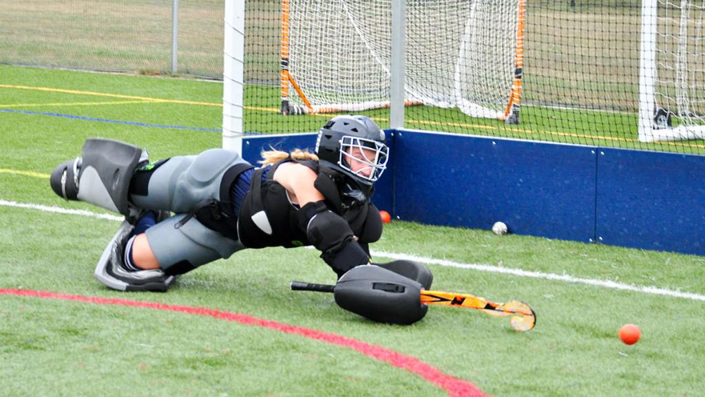 Freshman Shelby McDavid dives to save a ball during the field hockey teams practice Sept. 28 at Higgins Stadium. McDavid tried out for the backup goalie position during preseason.