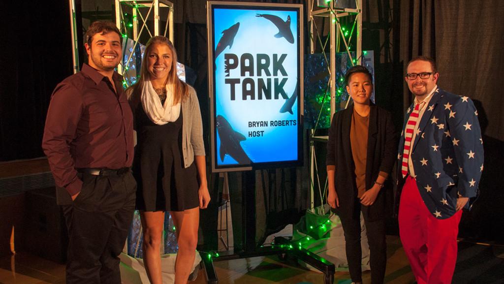 From left, Park Tank winners senior Dominick Recckio, freshman Alexa Dargis and senior Prairwa “Sunny” Leerasanthanah stand with Bryan Roberts, associate dean of the Park School of Communications.