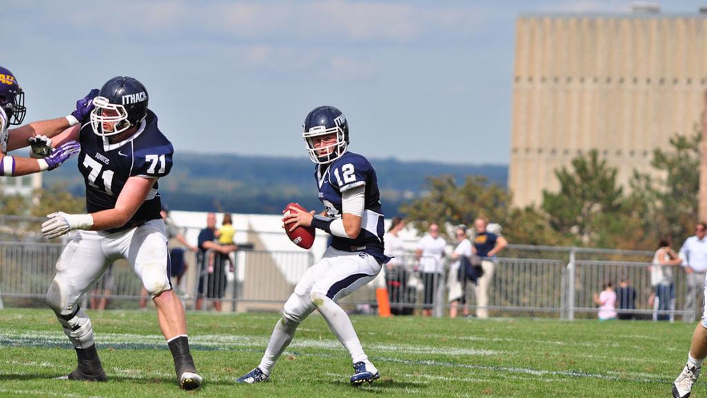 Junior starting quarterback Wolfgang Shafer takes back the snap during the football team's game against Alfred University on Sept. 26 at Butterfield Stadium. The Bombers will look to go 4–0 on the season as they take on the Utica College Pioneers on Oct. 3 in Utica, New York.