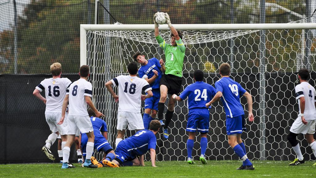 Junior goalkeeper Zach Jacobsoen, a transfer student from Lincoln Memorial University in Tennessee, saves the ball during a men’s soccer game against Hamilton College on Oct. 6 at Carp Wood Field.