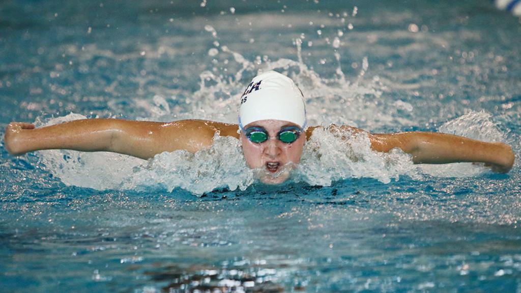 Senior Megan Zart swims in the 50-yard butterfly during the women’s swimming and  diving meet Oct. 24 at the Athletics and Events Center. Zart finished in first place.