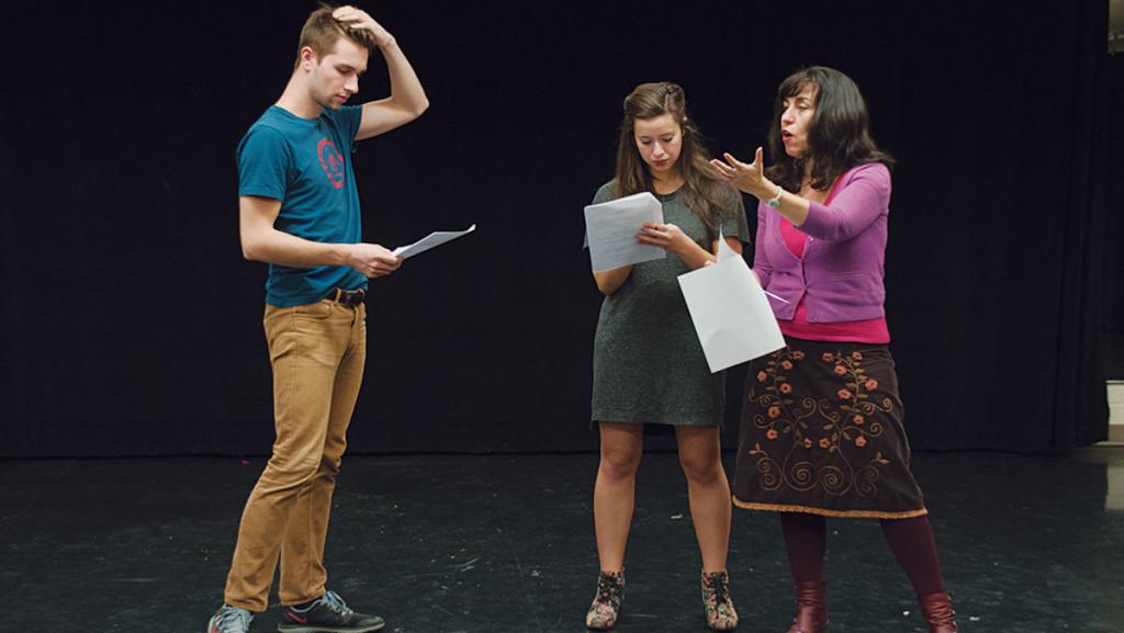 From left, senior Niko Kaim and junior Danielle Newmark rehearse with director Saviana Condeescu for a series of short plays about climate change that will be performed at 5 p.m. Nov. 6 in the Gannett Center.