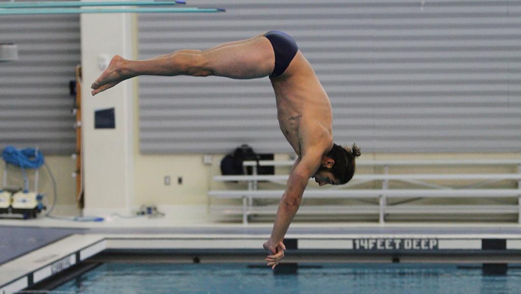 Senior+Jon+Yoskin+competes+in+the+3-meter+dive+during+the+swimming+and+diving+meet+against+SUNY+Cortland+on+Nov.+7+at+the+Athletics+and+Events+Center.+Yoskin+came+in+fourth+in+the+event.