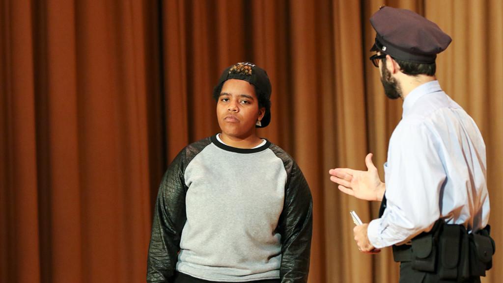From left, actors Jay Towns and Seth Soulstein play Julian and Officer James, respectively, in the Civic Ensemble play “On The Corner,” which comments on issues of racism.