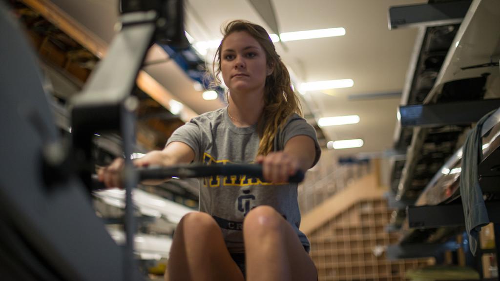 Freshman Abby Mellinger, on the womens crew team, works out on a stationary rowing machine Nov. 13 at the Robert B. Tallman Rowing Center at Cayuga Inlet.