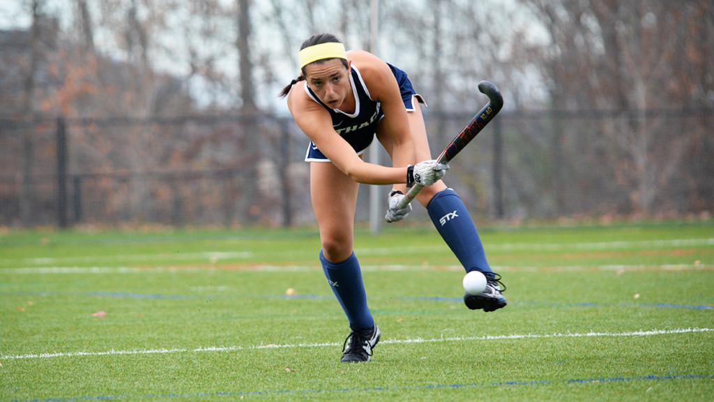 Sophomore forward Amanda Schell passes the ball up the field in the field hockey teams 4–1 loss to Stevens Institute of Technology in the Empire 8 Championship final on Nov. 7 at Higgins Stadium. 