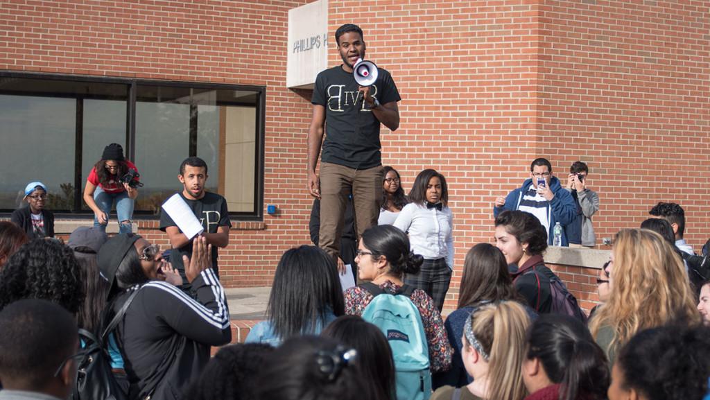 Senior Eddy Tapia speaks at the POC at IC rally Oct. 21 at Free Speech Rock. 