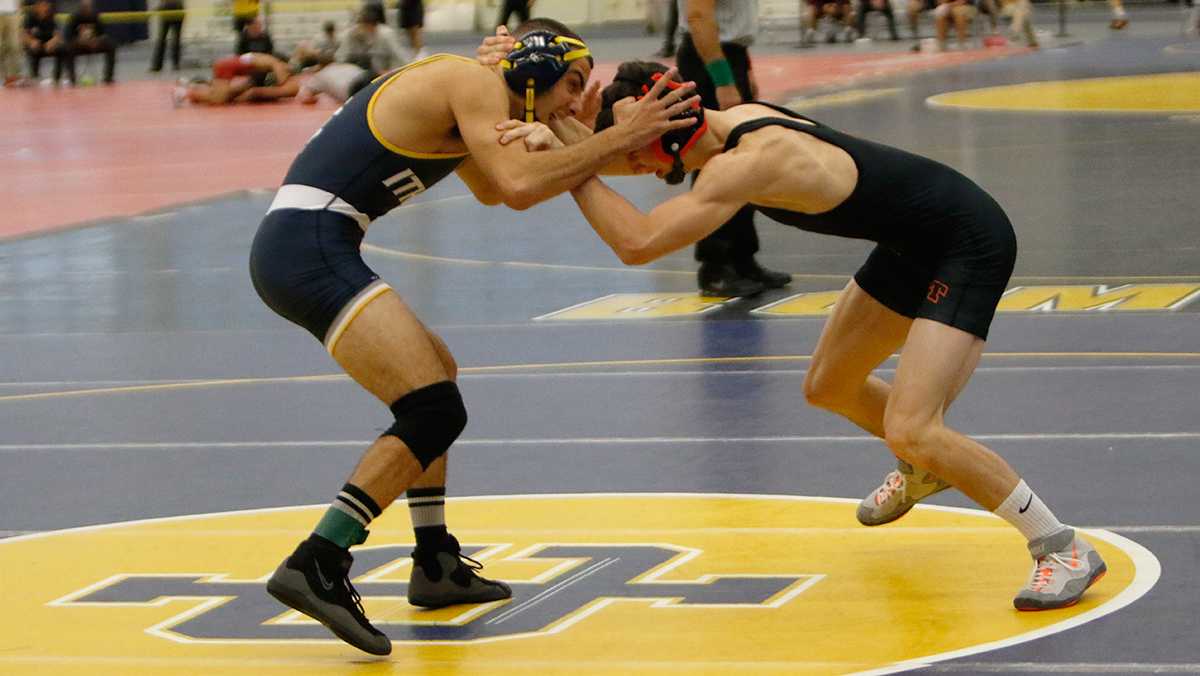 Wrestling squad captures first place in Ithaca Invitational