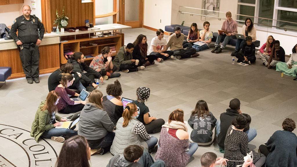 Members of POC at IC participate in the occupation of Peggy Ryan Williams Center the night of Dec. 7. The occupation has continued to a second day. 
