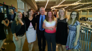 The Suddaby family  poses after gymnastics coach Rick Suddaby was inducted into the hall of fame on Sept. 25.