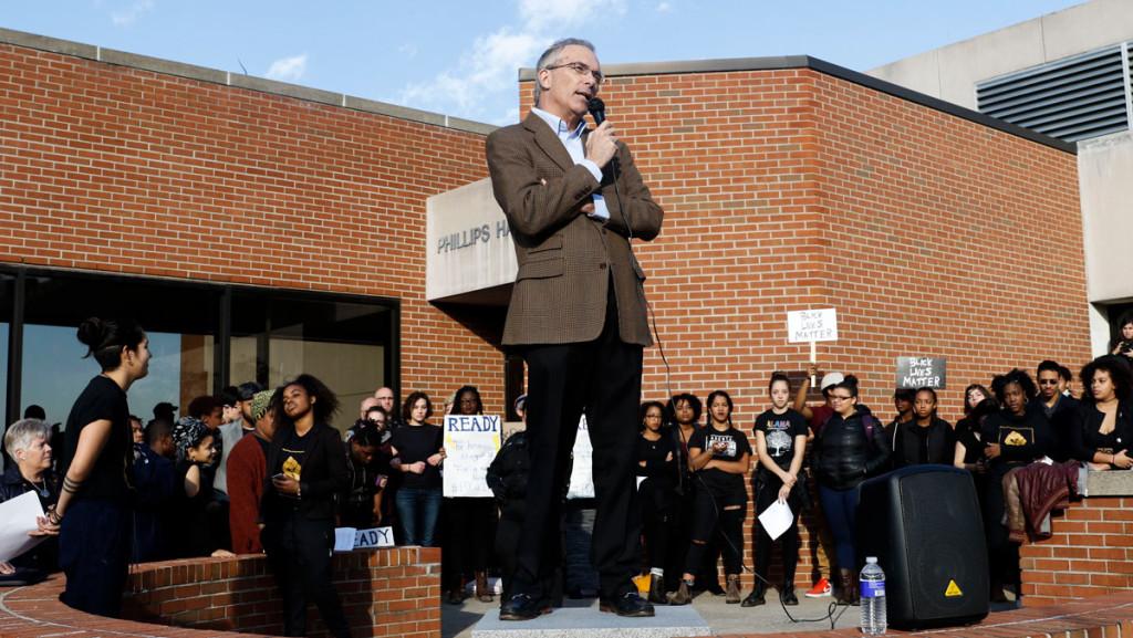 Ithaca College President Tom Rochon speaks at a People of Color at IC walk-out rally Dec. 11, 2015, after being called up to Free Speech Rock by protesters. Rochon has announced he will retire, effective July 1, 2017. 