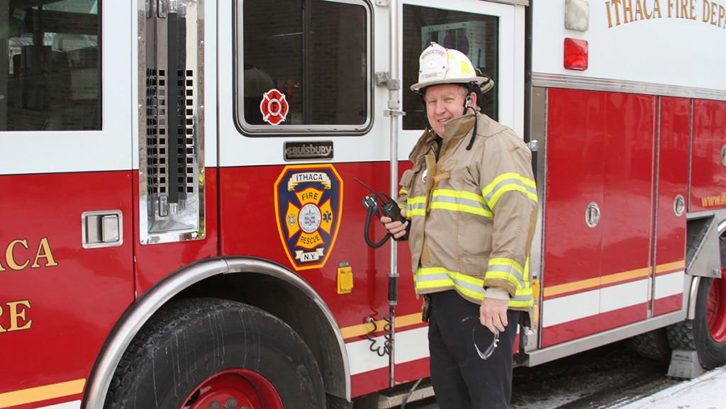 Guy Van Benschoten ’74 suits up Feb. 13 outside the Ithaca Fire Department. The Ithaca College alumnus will retire from his post as the IFD assistant fire chief Feb. 22, after 41 years there.