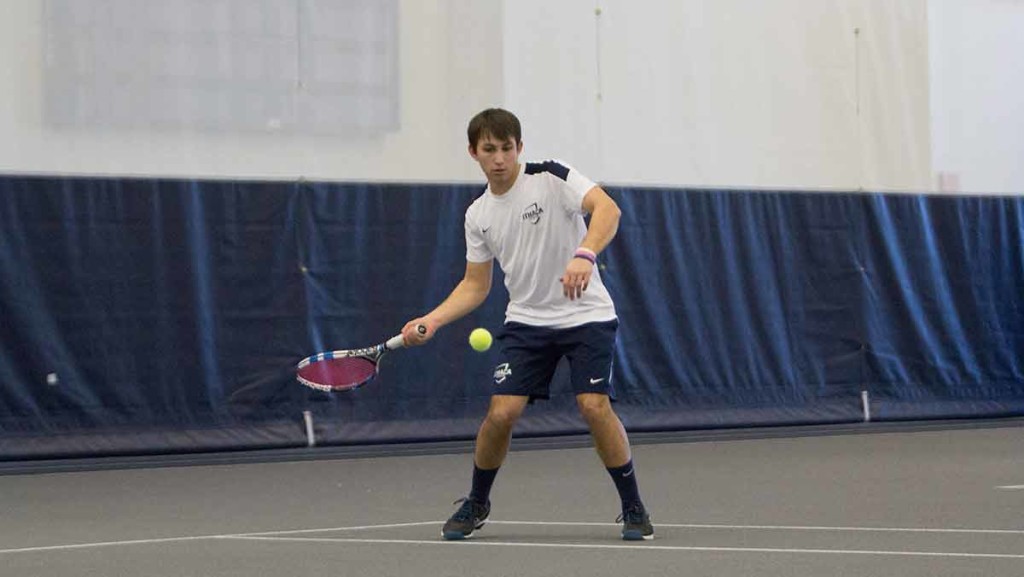 Senior Chris Hayes plays in his tennis match Feb. 14 against the University of Rochester in Ben Glazer Arena. Hayes is the only senior on the mens tennis team.