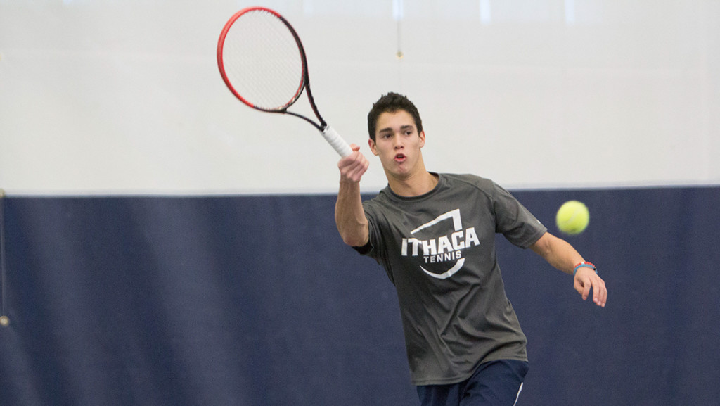Freshman Michael Gardiner plays in his first match of the season Feb. 14. Gardiner won both his singles and doubles matches. 