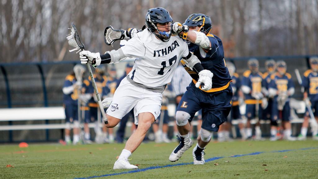 Freshman midfielder Brandon Lao works around a defender in a game against Lycoming College March 1 at Higgins Stadium. The Bombers defeated the Warriors 20–1.