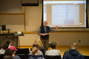 Associate professor John White teaches the course, Music in Society. Sam Fuller/The Ithacan