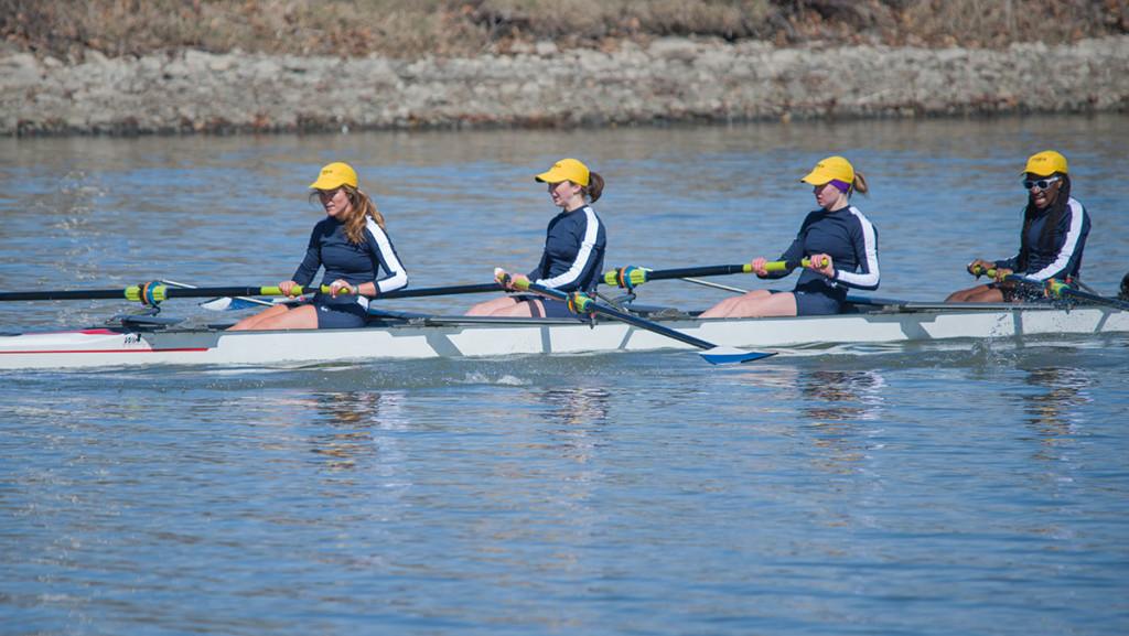 Members of the womens novice four boat compete against William Smith College on March 26 at the Cayuga Inlet. 