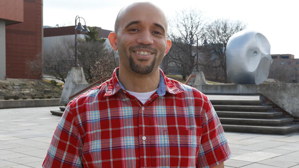 After finding a passion for literature that highlights issues of racial identity, Derek Adams, assistant professor in the Department of English strives to create a safe space for students of color in his own classroom at Ithaca College. 