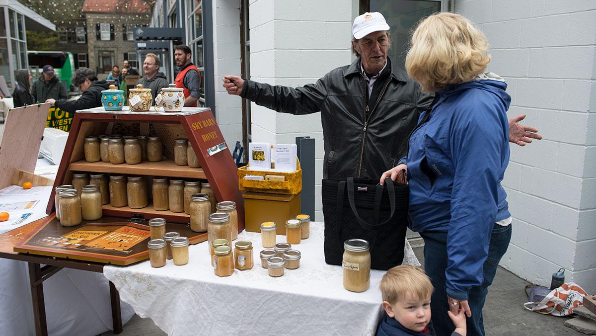 David Hopkins, a beekeeper educator, sold honey at the Climate Solutions Fair from Sky Barn Apiaries in Willseyville, New York. As a beekeeper at Sky Barn, Hopkins mentors new beekeepers with equipment, facilities and bee knowledge.
