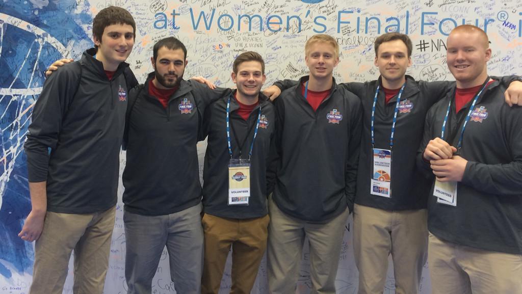Eight students, six whom are shown above, had the opportunity to volunteer at the Tourney Town in Indianapolis, Indiana, in between watching the basketball games.
