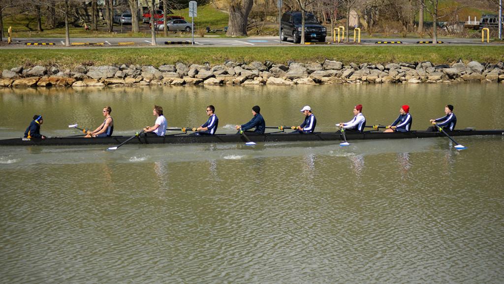 Members of the mens crew compete against SUNY Geneseo on April 10 on the Cayuga Inlet. They had four first place finishes that day.
