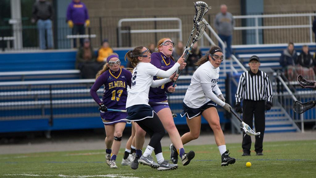 The women's lacrosse team defeated Elmira College March 23 22–1 in Higgins Stadium for its first Empire 8 win of the season.