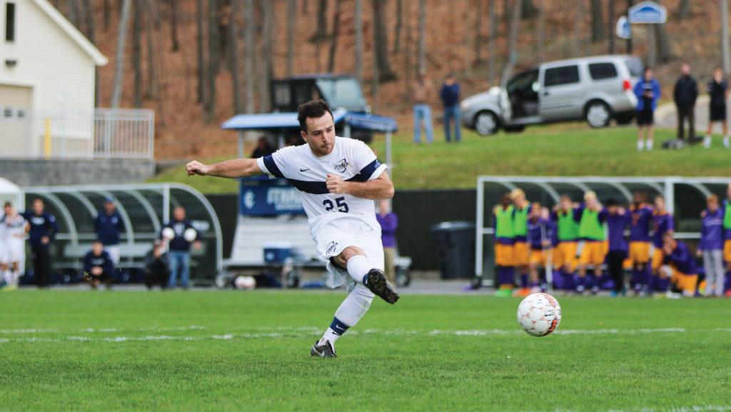 Senior Sam Boylan shoots a penalty kick against Elmira College in the first round of the Empire 8 Championships on Nov. 6, 2015.