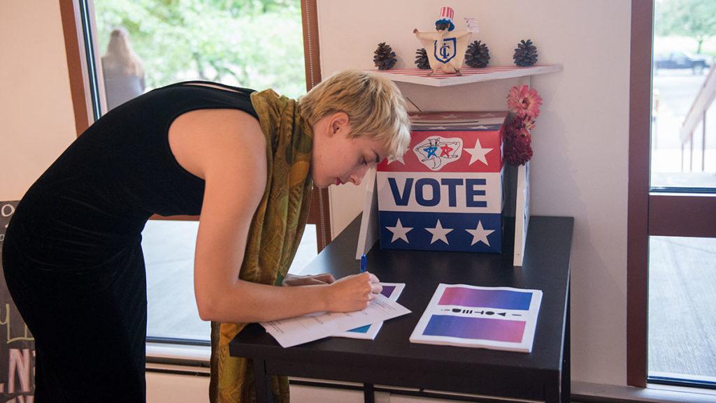 Sophomore Anna Gardner, one of the student collaborators for the project “Official Unofficial Voting Station: Voting for all who legally can’t” took her ballot to the polls Aug. 31 when the piece opened. The station will be up until Nov. 8.