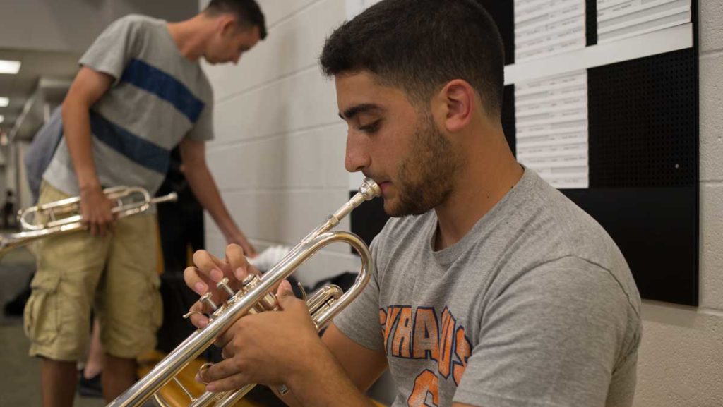 Ithaca College students practice outside of the audition room in the James J. Whalen Center for Music while they wait for their numbers to be called.