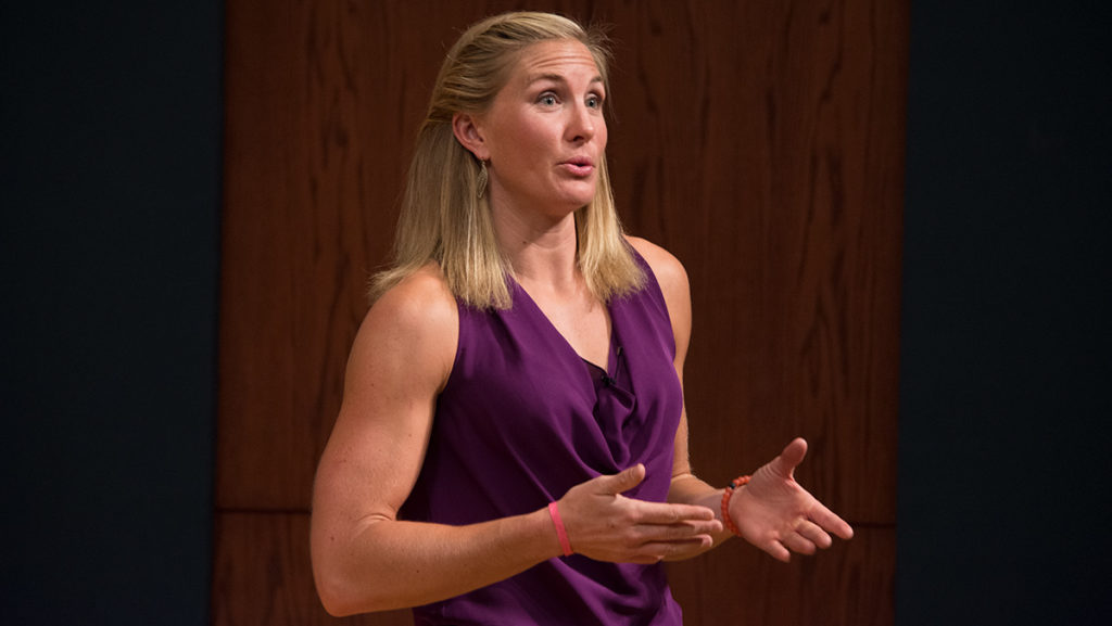 Meghan Musnicki 05, who won a gold medal at the 2012 London Olympic Games and 2016 Rio de Janeiro Olympic Games as part of the United States womens eight boat, address the crowd Sept. 27 Hockett Family Recital Hall.