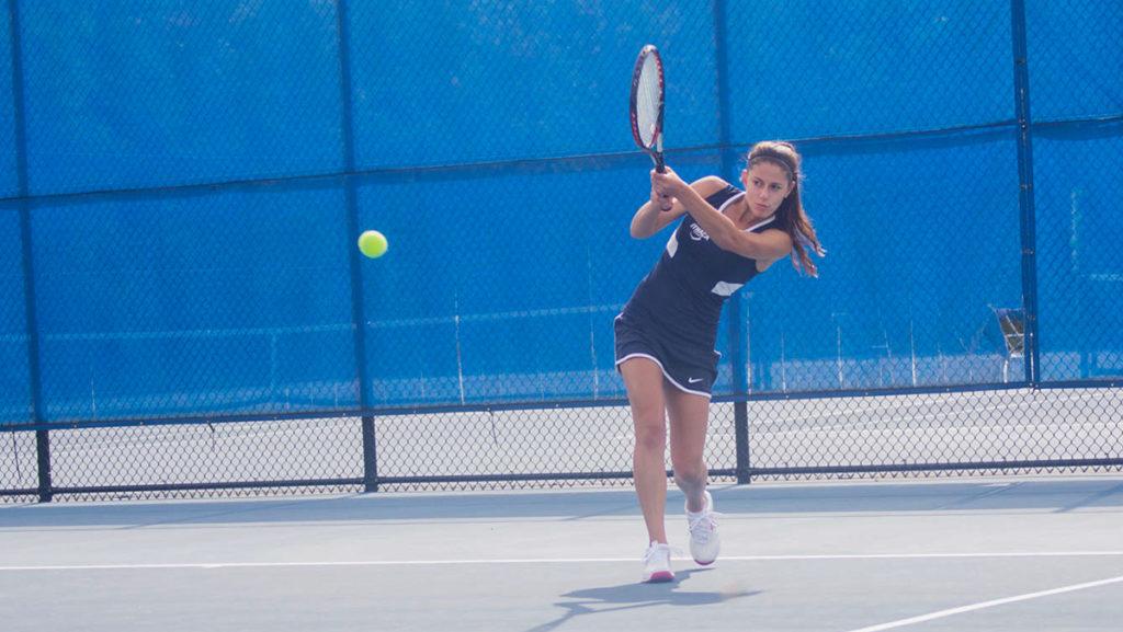 Freshman+Brianna+Ruback+returns+the+ball+to+Houghton+College+on+Sept.+26+on+the+Ben+Wheeler+Tennis+Courts.+She+won+her+singles+match+6%E2%80%930%2C+6%E2%80%930+and+her+doubles+match+8%E2%80%930.
