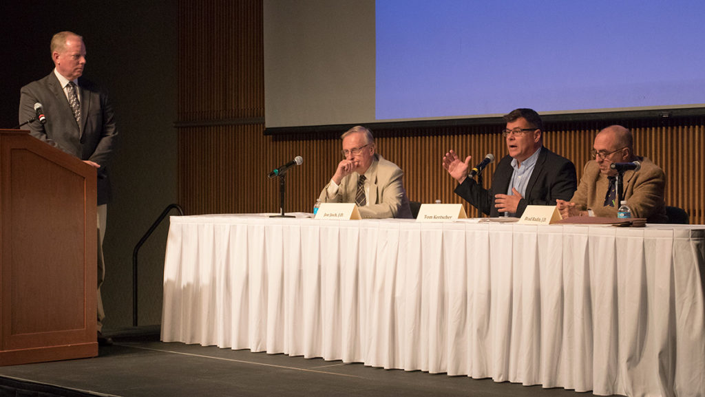 From left, Mead Loop, an associate professor in the Department of Journalism; Joe Joch, a lawyer and prosecutor who was elected the Tompkins County district attorney in 1974; Tom Kertscher, a journalist from the Milwaukee Journal Sentinel and Brad Rudin, a Tompkins County assistant district attorney, discuss Steven Averys case. 