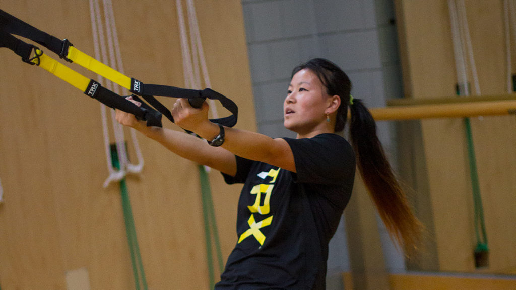 Junior Maggie Eckerson teaches total resistance exercise (TRX) classes from 5 to 5:45 p.m. every Sunday. She attended a TRX instructor training camp after her freshman  year of college for certification to be able to teach the course. 