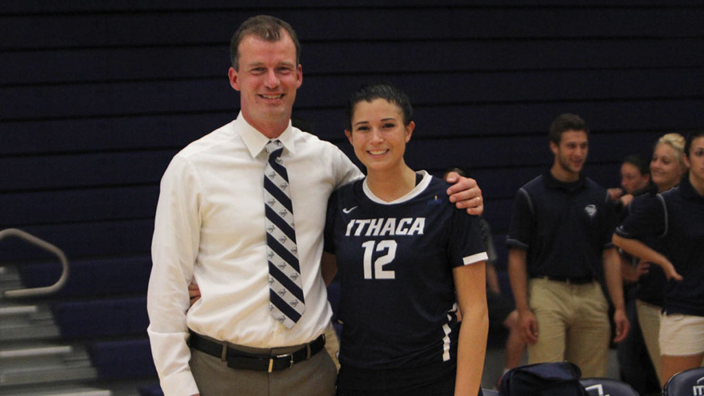 Head coach Johan Dulfer and sophomore defensive specialist Tara Stillwell after their first home game as Bombers. They beat SUNY Oswego in three sets Sept. 6 in Ben Light Gymnasium. 