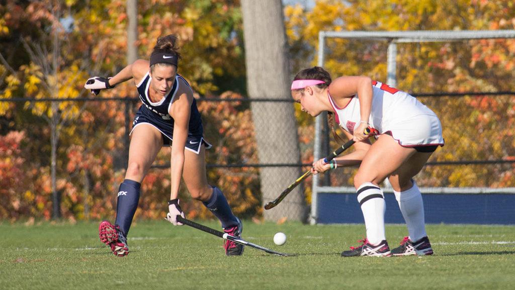 Senior midfielder and forward Colleen Keegan-Twombly battles a Susquehanna University player for possession Oct. 18 in Higgins Stadium. She scored one goal in the Bombers 5–3 loss. 