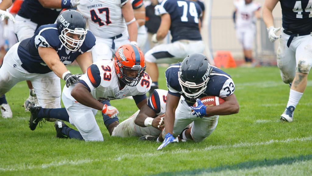 Junior running back Tristan Brown lunges toward the end zone in Ithaca Colleges win over Utica College. 
