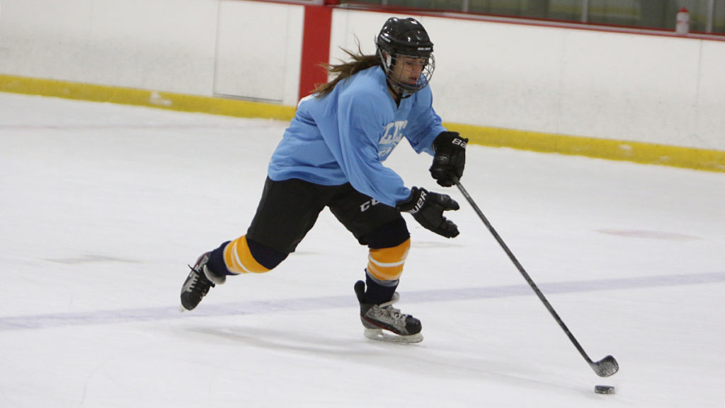 Player skates onto Ithaca College mens club hockey team