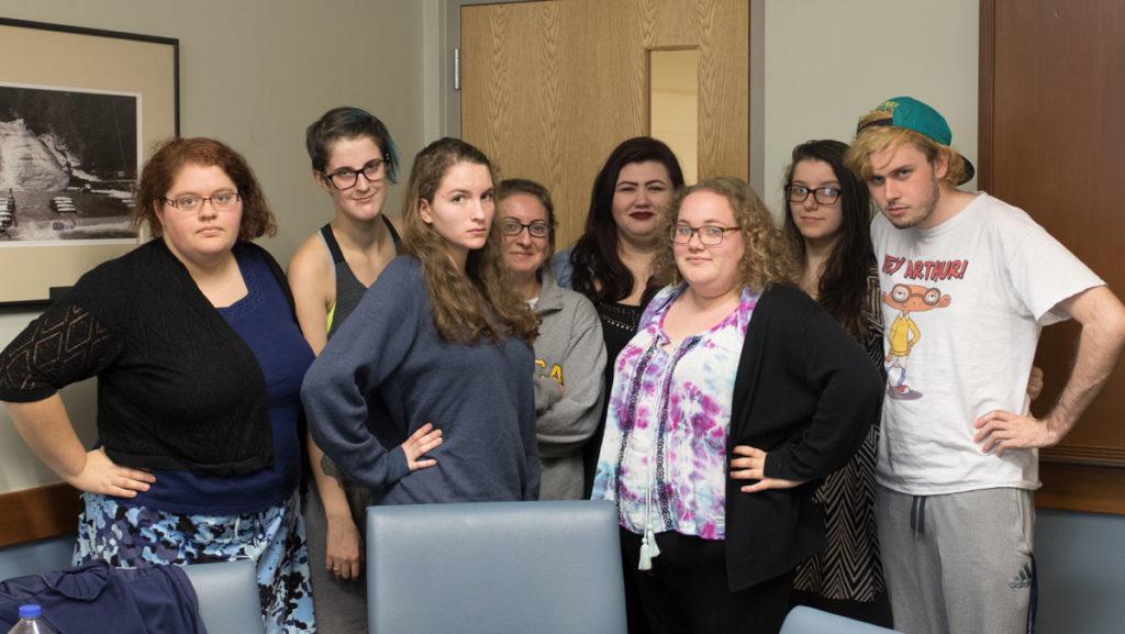 IC Active Minds, pictured above, is a club dedicated to raising awareness to mental illness on Ithaca Colleges campus. Molly Robbins, third from right, is co-president of the club and has criticized the college for not providing enough counselors for its students. 
