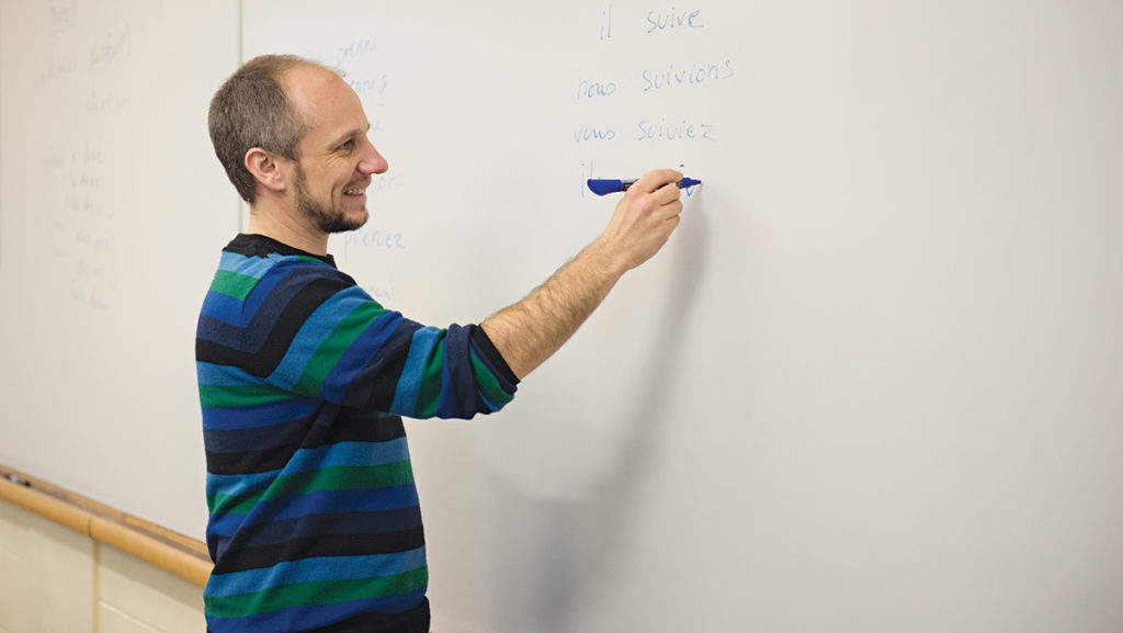 Alex Lenoble, a lecturer in the French program, teaches a class. He is one of three faculty members who started teaching in the French Department this semester. 