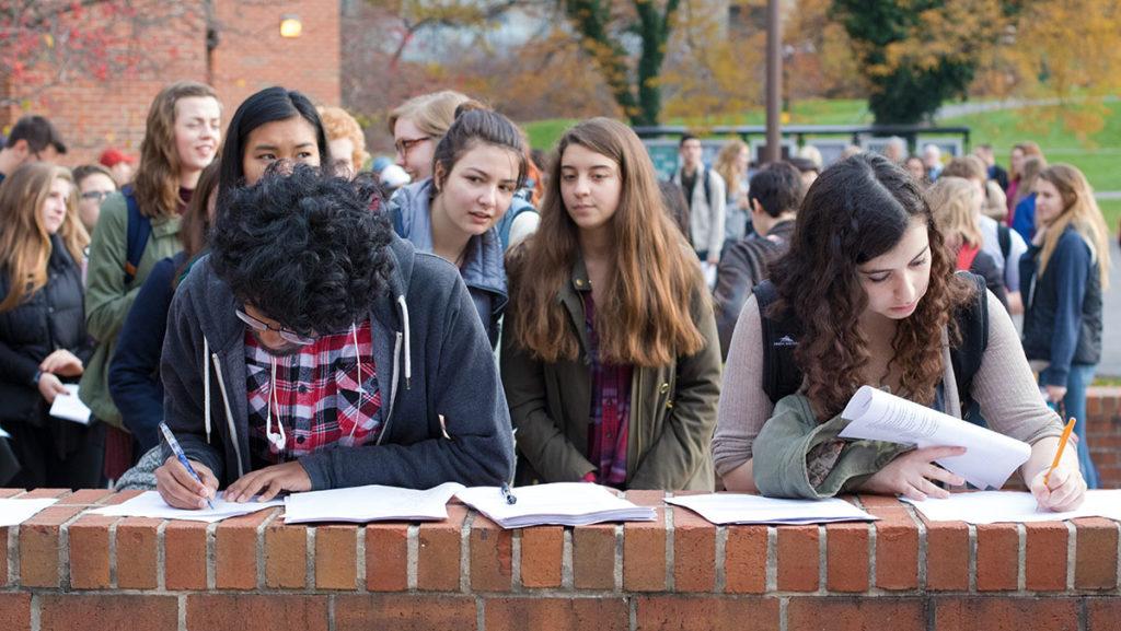 Students sign a petition to pressure the Ithaca College administration to declare the campus a “sanctuary campus. By the end, over 100 students signed the petition. The movement has caught on nationwide since Donald Trumps election to the presidency last week.