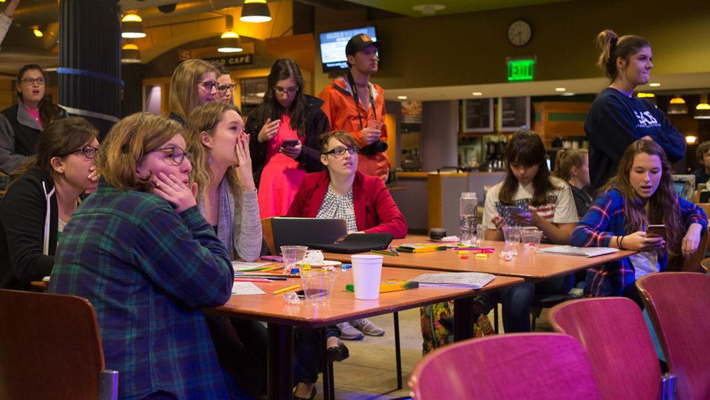 Ithaca college students watch election results in IC Square on Nov. 9.